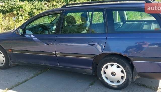Серый Опель Омега, объемом двигателя 2 л и пробегом 287 тыс. км за 2200 $, фото 1 на Automoto.ua