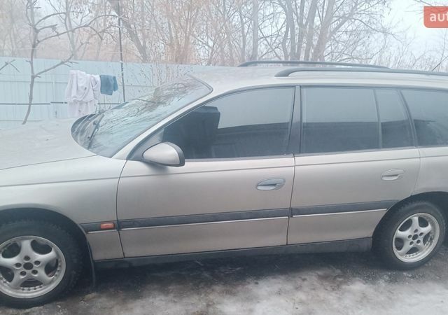 Серый Опель Омега, объемом двигателя 2.5 л и пробегом 148 тыс. км за 2700 $, фото 1 на Automoto.ua