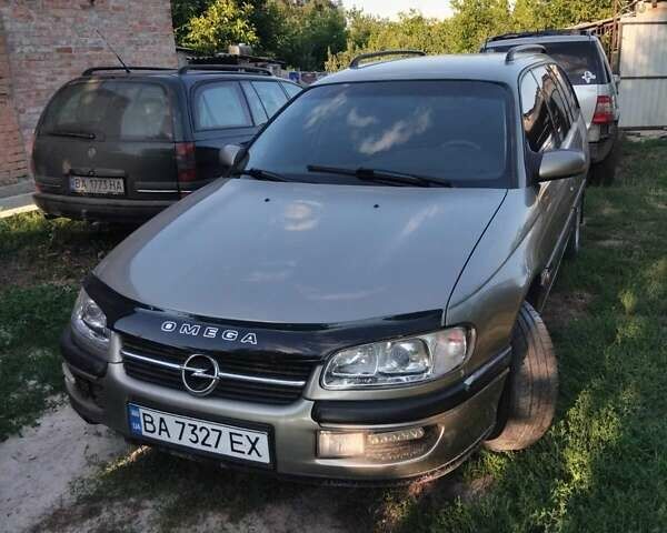 Сірий Опель Омега, об'ємом двигуна 2.5 л та пробігом 250 тис. км за 2900 $, фото 1 на Automoto.ua