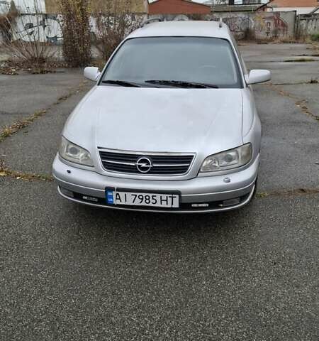 Серый Опель Омега, объемом двигателя 2.5 л и пробегом 310 тыс. км за 3200 $, фото 1 на Automoto.ua