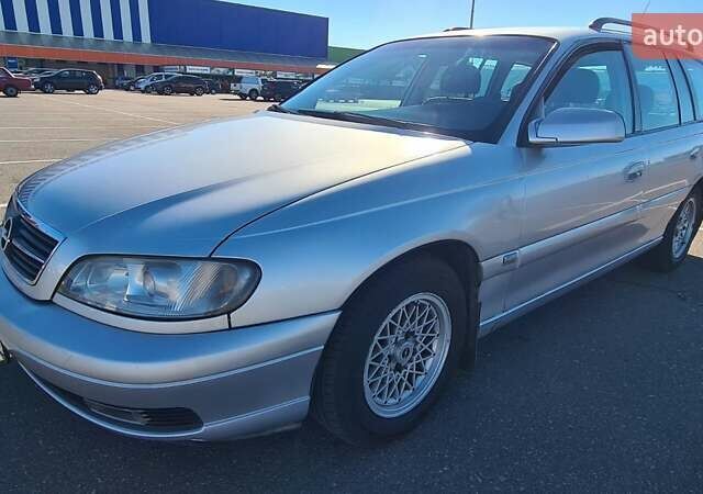 Серый Опель Омега, объемом двигателя 2.2 л и пробегом 247 тыс. км за 4100 $, фото 1 на Automoto.ua