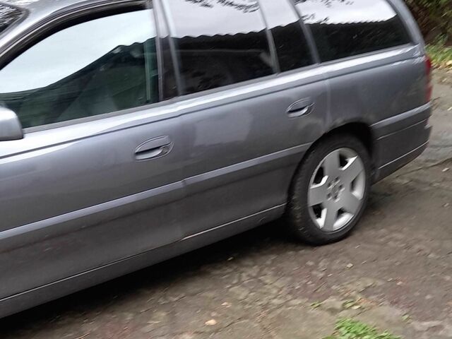 Серый Опель Омега, объемом двигателя 2.2 л и пробегом 330 тыс. км за 1500 $, фото 1 на Automoto.ua