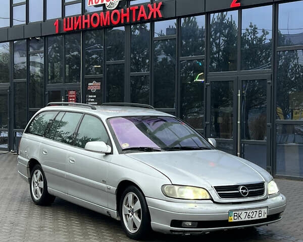 Серый Опель Омега, объемом двигателя 2.5 л и пробегом 361 тыс. км за 2850 $, фото 1 на Automoto.ua