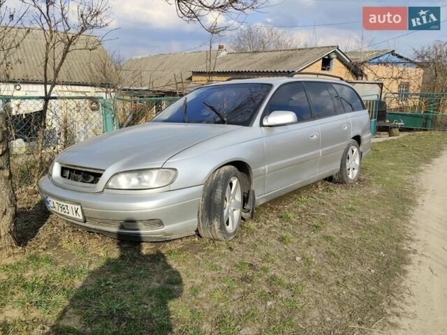 Серый Опель Омега, объемом двигателя 2.5 л и пробегом 251 тыс. км за 1200 $, фото 1 на Automoto.ua