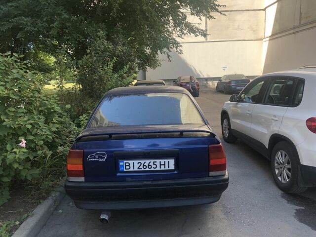 Синій Опель Омега, об'ємом двигуна 2 л та пробігом 381 тис. км за 560 $, фото 1 на Automoto.ua