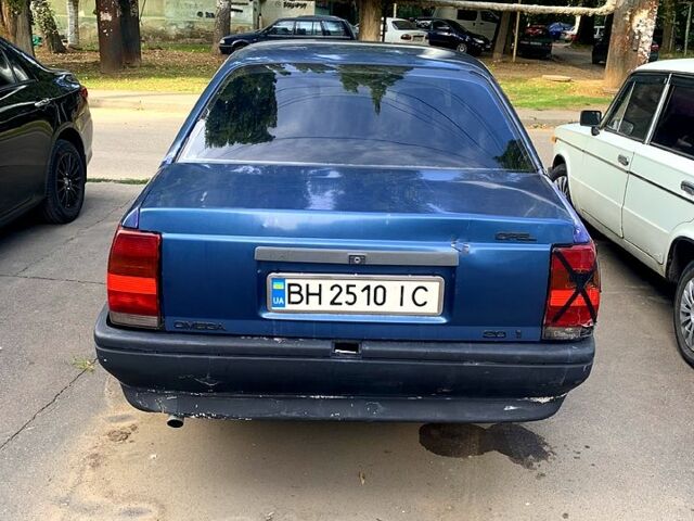 Синий Опель Омега, объемом двигателя 2 л и пробегом 330 тыс. км за 550 $, фото 1 на Automoto.ua