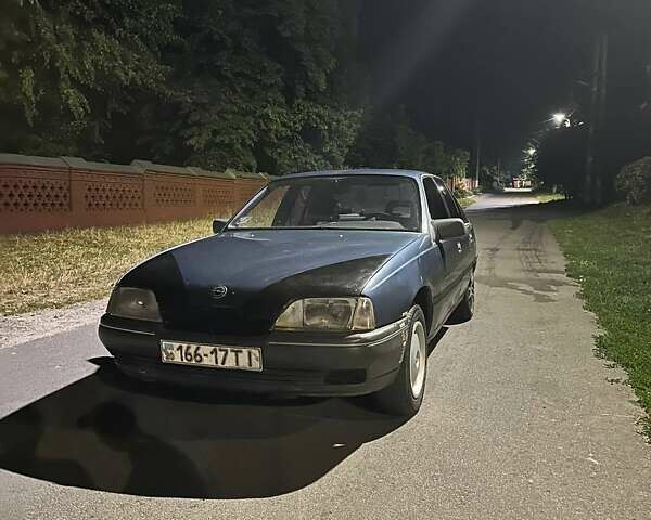 Синий Опель Омега, объемом двигателя 1.8 л и пробегом 343 тыс. км за 1000 $, фото 1 на Automoto.ua