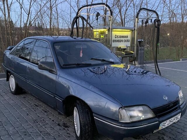 Синий Опель Омега, объемом двигателя 2 л и пробегом 300 тыс. км за 550 $, фото 1 на Automoto.ua