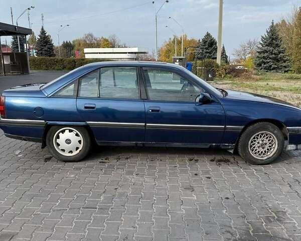 Синий Опель Омега, объемом двигателя 2 л и пробегом 300 тыс. км за 1300 $, фото 1 на Automoto.ua