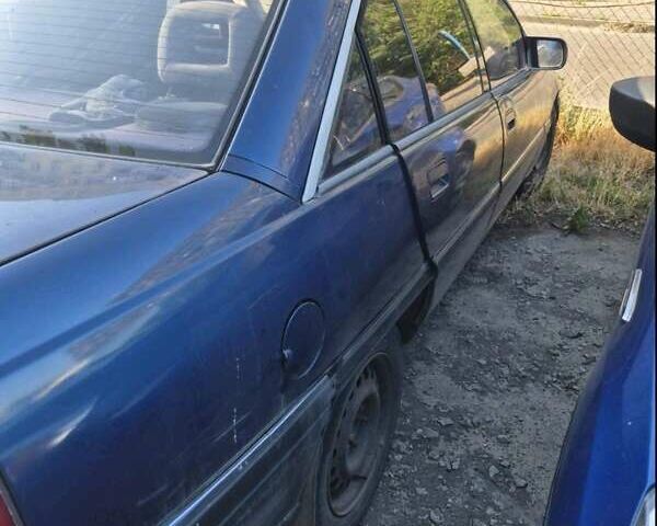 Синій Опель Омега, об'ємом двигуна 1.98 л та пробігом 300 тис. км за 1500 $, фото 1 на Automoto.ua