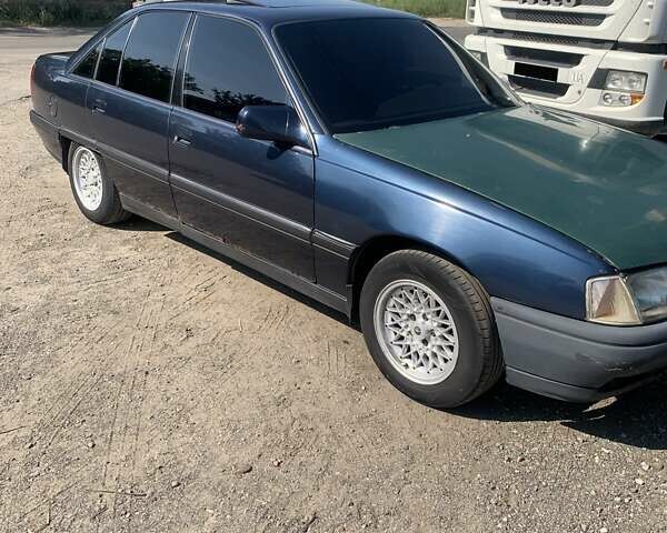 Синий Опель Омега, объемом двигателя 2 л и пробегом 200 тыс. км за 1000 $, фото 1 на Automoto.ua