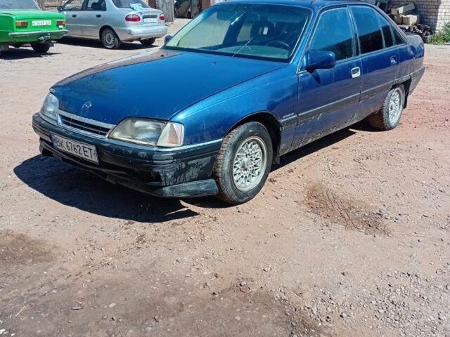 Синий Опель Омега, объемом двигателя 2 л и пробегом 260 тыс. км за 400 $, фото 1 на Automoto.ua