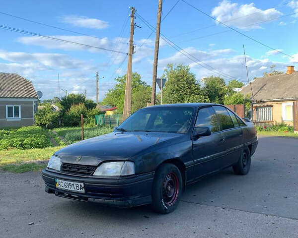 Синий Опель Омега, объемом двигателя 2 л и пробегом 285 тыс. км за 650 $, фото 1 на Automoto.ua