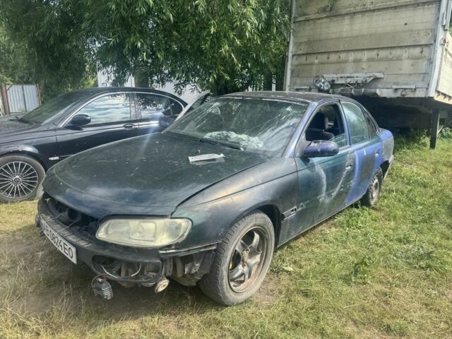 Синий Опель Омега, объемом двигателя 2.5 л и пробегом 333 тыс. км за 700 $, фото 1 на Automoto.ua