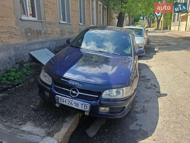 Синий Опель Омега, объемом двигателя 2 л и пробегом 495 тыс. км за 2300 $, фото 1 на Automoto.ua