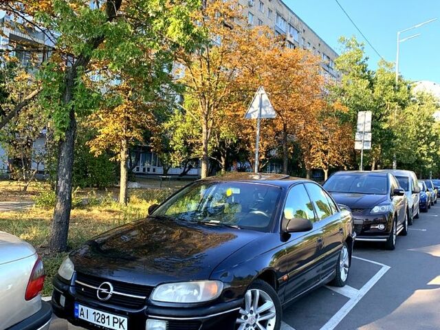 Синий Опель Омега, объемом двигателя 2.5 л и пробегом 425 тыс. км за 1999 $, фото 1 на Automoto.ua