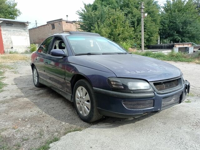 Синий Опель Омега, объемом двигателя 3 л и пробегом 216 тыс. км за 800 $, фото 1 на Automoto.ua