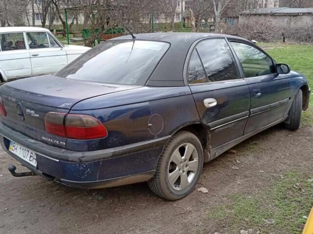 Синий Опель Омега, объемом двигателя 0 л и пробегом 450 тыс. км за 650 $, фото 1 на Automoto.ua