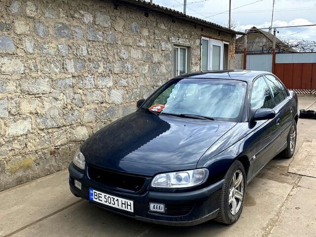 Синий Опель Омега, объемом двигателя 2 л и пробегом 300 тыс. км за 3100 $, фото 1 на Automoto.ua