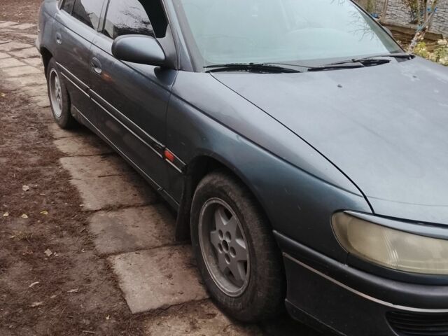 Синій Опель Омега, об'ємом двигуна 2 л та пробігом 250 тис. км за 1650 $, фото 1 на Automoto.ua