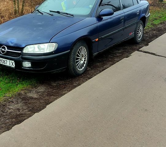 Синий Опель Омега, объемом двигателя 2.5 л и пробегом 320 тыс. км за 1800 $, фото 1 на Automoto.ua