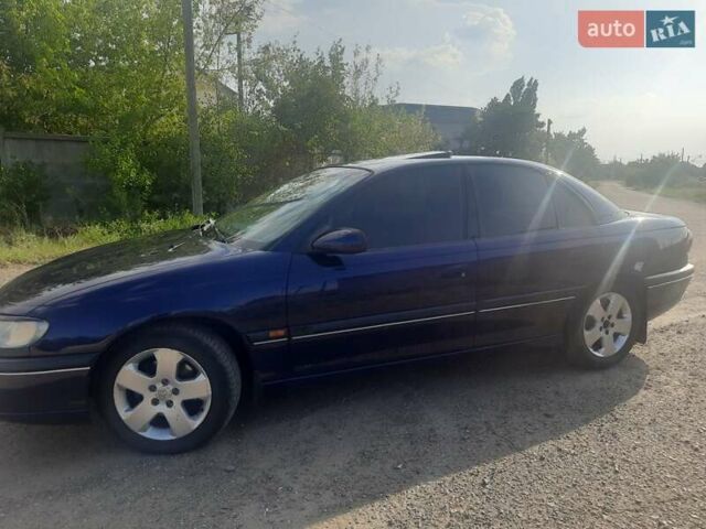 Синій Опель Омега, об'ємом двигуна 2 л та пробігом 305 тис. км за 3300 $, фото 1 на Automoto.ua