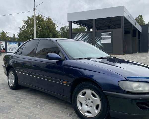 Синій Опель Омега, об'ємом двигуна 2 л та пробігом 250 тис. км за 1700 $, фото 1 на Automoto.ua