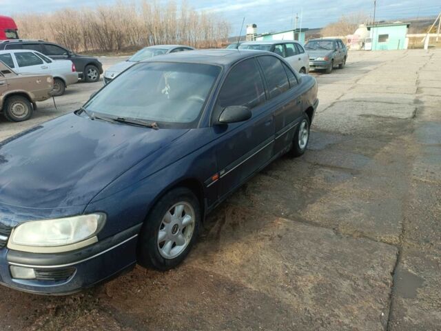 Синій Опель Омега, об'ємом двигуна 2 л та пробігом 440 тис. км за 1300 $, фото 1 на Automoto.ua