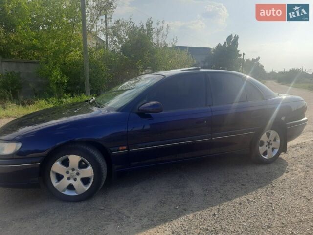 Синий Опель Омега, объемом двигателя 2 л и пробегом 305 тыс. км за 2600 $, фото 1 на Automoto.ua