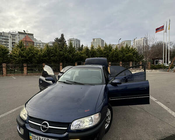 Синий Опель Омега, объемом двигателя 3 л и пробегом 426 тыс. км за 2000 $, фото 1 на Automoto.ua