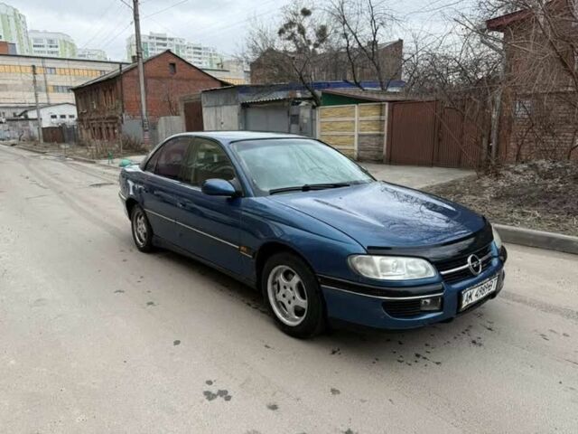 Синій Опель Омега, об'ємом двигуна 2 л та пробігом 250 тис. км за 999 $, фото 1 на Automoto.ua