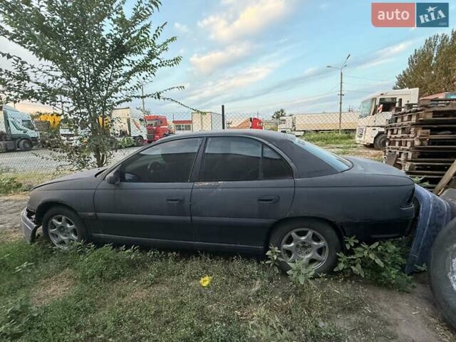 Синий Опель Омега, объемом двигателя 3 л и пробегом 560 тыс. км за 1500 $, фото 1 на Automoto.ua