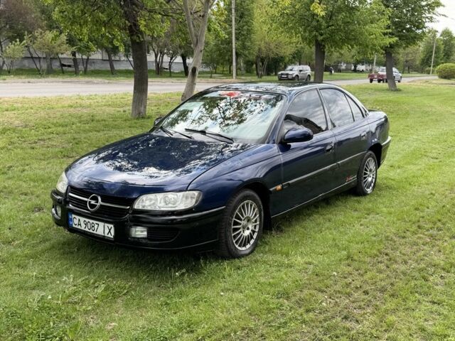 Синий Опель Омега, объемом двигателя 2.5 л и пробегом 200 тыс. км за 1550 $, фото 1 на Automoto.ua
