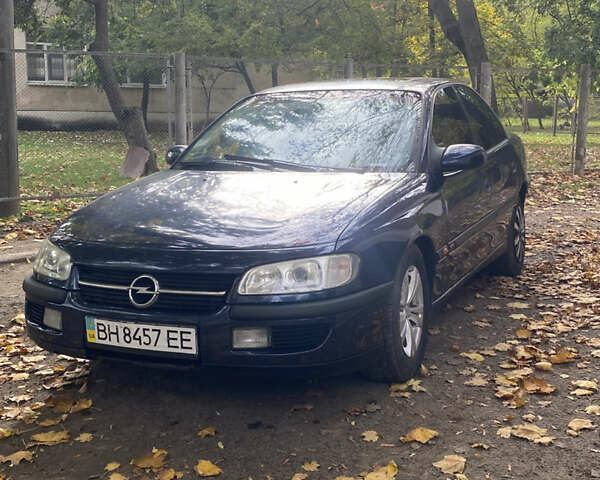 Синий Опель Омега, объемом двигателя 3 л и пробегом 422 тыс. км за 2200 $, фото 1 на Automoto.ua