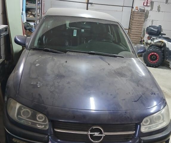 Синий Опель Омега, объемом двигателя 2 л и пробегом 60 тыс. км за 1800 $, фото 1 на Automoto.ua