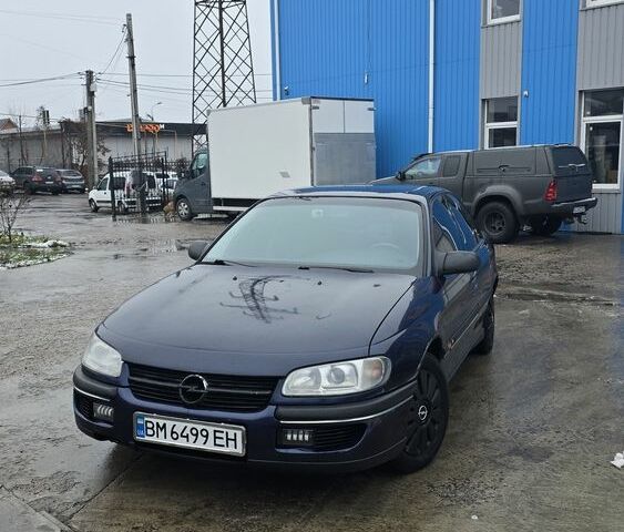 Синий Опель Омега, объемом двигателя 2 л и пробегом 345 тыс. км за 2800 $, фото 1 на Automoto.ua