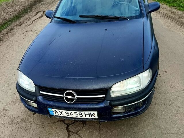 Синий Опель Омега, объемом двигателя 2.5 л и пробегом 111 тыс. км за 1600 $, фото 1 на Automoto.ua