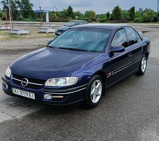 Синий Опель Омега, объемом двигателя 2 л и пробегом 60 тыс. км за 1800 $, фото 1 на Automoto.ua