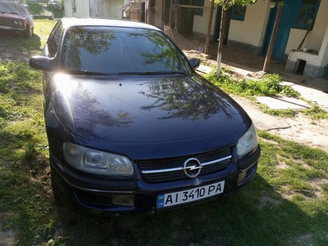 Синий Опель Омега, объемом двигателя 2 л и пробегом 200 тыс. км за 1200 $, фото 1 на Automoto.ua