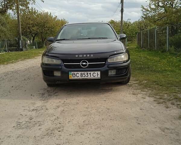 Синий Опель Омега, объемом двигателя 2.5 л и пробегом 297 тыс. км за 2000 $, фото 1 на Automoto.ua