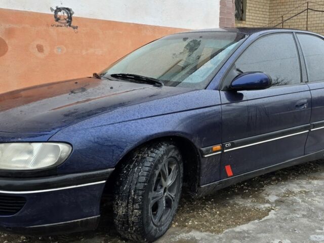 Синий Опель Омега, объемом двигателя 2 л и пробегом 380 тыс. км за 1350 $, фото 1 на Automoto.ua