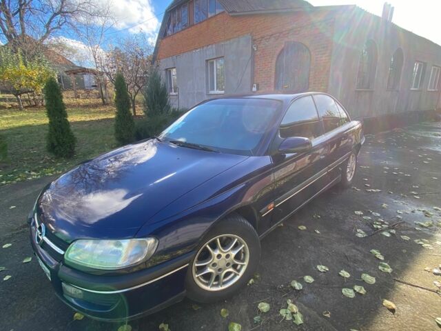 Синий Опель Омега, объемом двигателя 2 л и пробегом 400 тыс. км за 1700 $, фото 1 на Automoto.ua