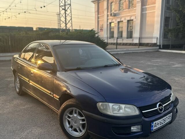Синій Опель Омега, об'ємом двигуна 2 л та пробігом 295 тис. км за 1606 $, фото 1 на Automoto.ua