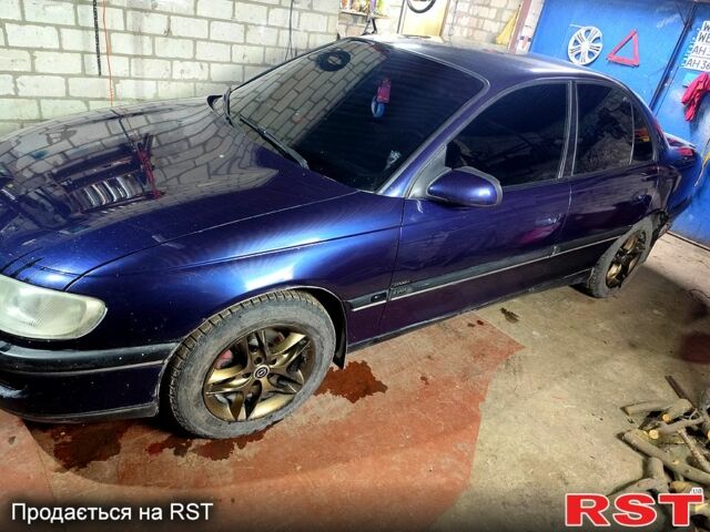 Синий Опель Омега, объемом двигателя 2.5 л и пробегом 385 тыс. км за 3400 $, фото 1 на Automoto.ua