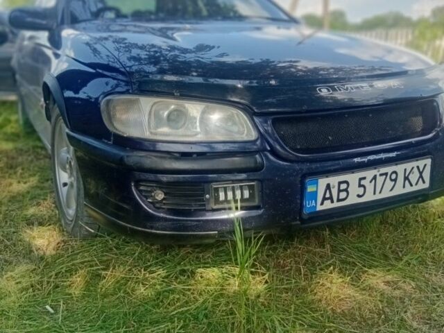 Синий Опель Омега, объемом двигателя 2.5 л и пробегом 440 тыс. км за 2206 $, фото 1 на Automoto.ua
