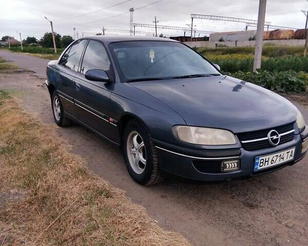 Синий Опель Омега, объемом двигателя 2 л и пробегом 300 тыс. км за 2200 $, фото 1 на Automoto.ua