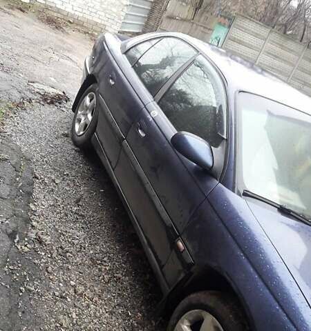 Синій Опель Омега, об'ємом двигуна 2.5 л та пробігом 250 тис. км за 2300 $, фото 1 на Automoto.ua