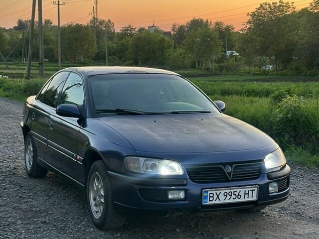 Синій Опель Омега, об'ємом двигуна 2 л та пробігом 237 тис. км за 1950 $, фото 1 на Automoto.ua