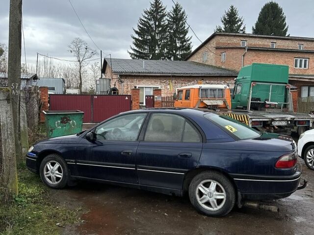 Синий Опель Омега, объемом двигателя 2 л и пробегом 200 тыс. км за 700 $, фото 1 на Automoto.ua