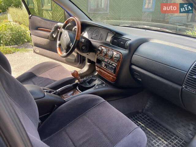 Синий Опель Омега, объемом двигателя 2 л и пробегом 348 тыс. км за 3300 $, фото 1 на Automoto.ua